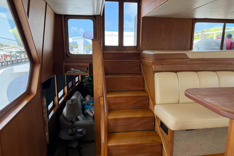 Slide: The Image of Control panel of 1997 Real Ships 61' Islander, featuring communication equipment and vessel details. - 13