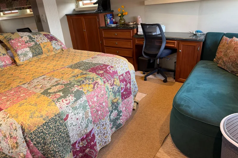 Slide: The Image of Luxurious bathroom on 1997 Real Ships 61' Islander yacht with marble shower and gold accents. - 16