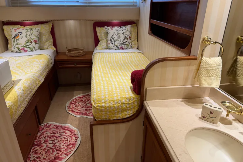 Slide: The Image of Engine room of a 1997 Real Ships 61' Islander with visible machinery and equipment. - 23