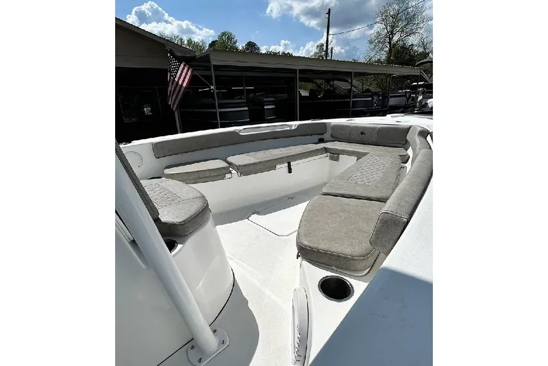 Slide: The Image of 2023 Sea Pro 199 Deep V Center Console boat interior with cushioned seating. - 4