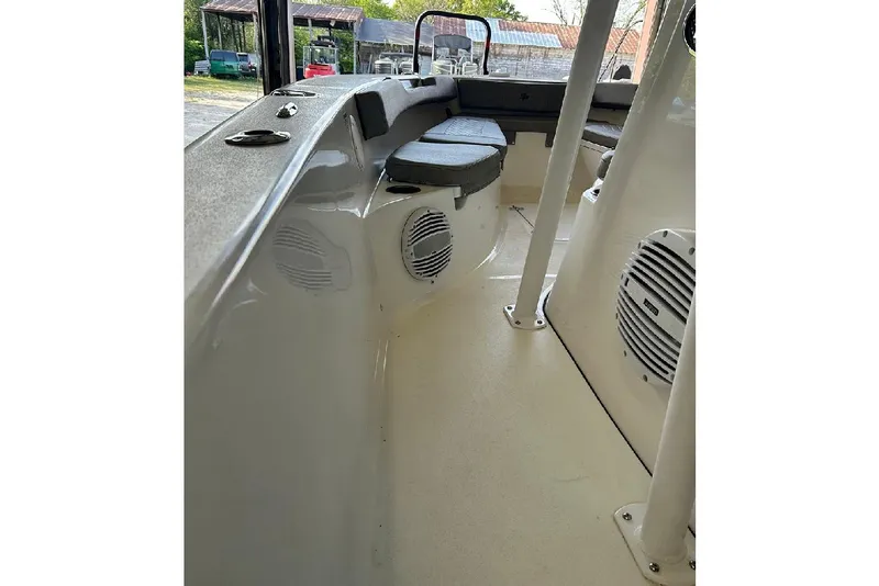 Slide: The Image of 2023 Sea Pro 199 Deep V Center Console interior with seating and speakers. - 8