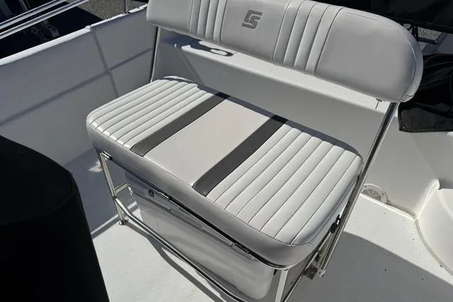 Slide: The Image of 2011 Carolina Skiff 218 DLV boat seat with gray and white upholstery. - 8