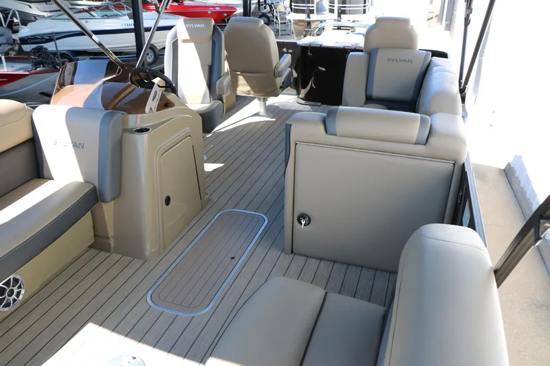 Slide: The Image of 2026 Sylvan Mirage X3 Party Fish boat interior with spacious seating and modern design. - 16