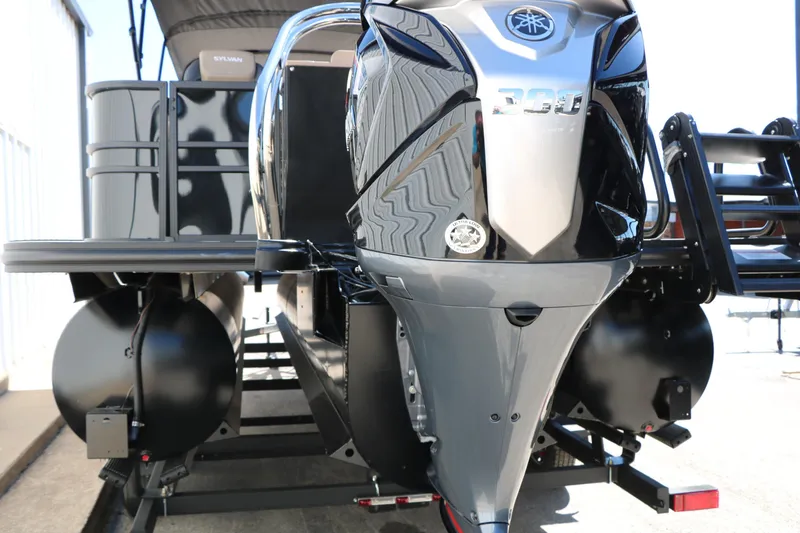 Slide: The Image of 2026 Sylvan Mirage X3 Party Fish boat with powerful outboard motor. - 43