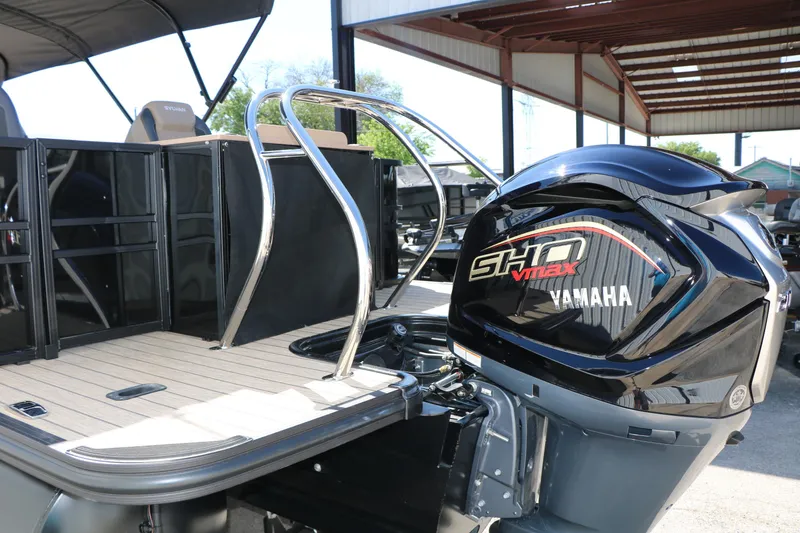 Slide: The Image of 2026 Sylvan Mirage X3 Party Fish with Yamaha SHO VMAX engine, docked under a canopy. - 8