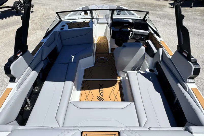 Slide: The Image of 2026 ATX Surf Boats 22 Type-S interior with sleek seating and modern dashboard design. - 6