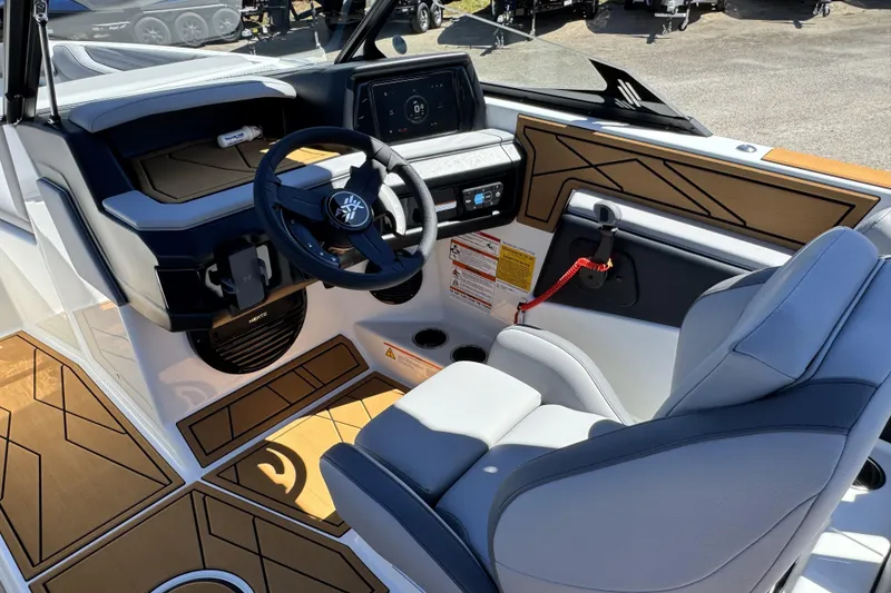Slide: The Image of 2026 ATX Surf Boats 22 Type-S cockpit with modern steering and dashboard design. - 7