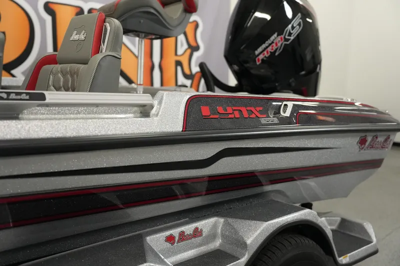 The Image of 2026 Bass Cat Lynx STS boat with sleek design and detailed branding. - 0