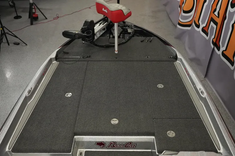 Slide: The Image of 2026 Bass Cat Lynx STS boat deck with trolling motor and seat. - 14