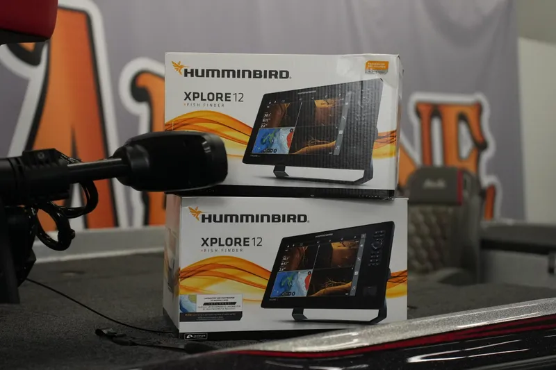 Slide: The Image of Boxes of Humminbird XPLORE 12 fish finders on a 2026 Bass Cat Lynx STS boat. - 33