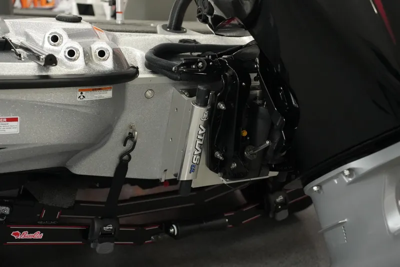 Slide: The Image of 2026 Bass Cat Lynx STS boat engine and hydraulic system close-up. - 6