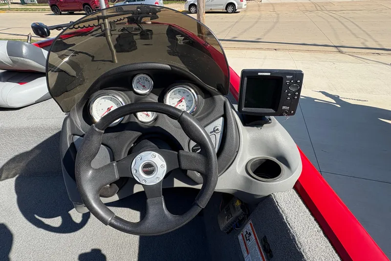 Slide: The Image of Steering console of 2011 Tracker Pro Team 175 TXW boat with gauges and fishfinder. - 10