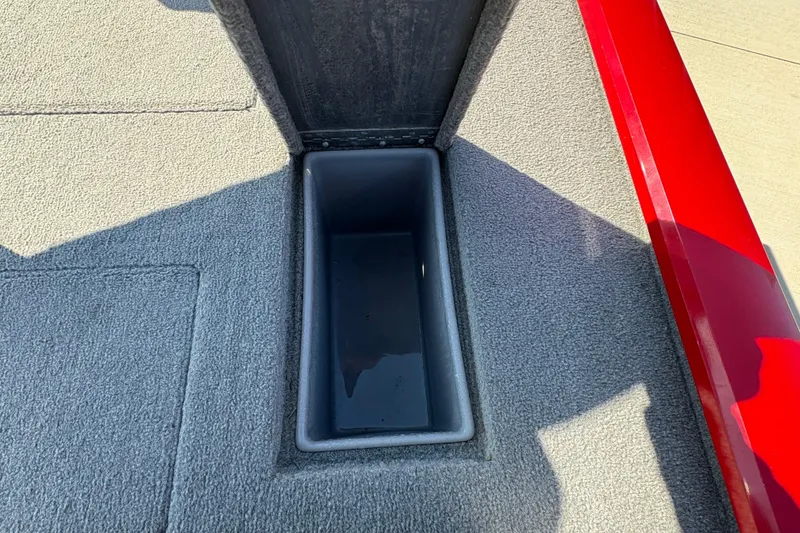 Slide: The Image of Open storage compartment on 2011 Tracker Pro Team 175 TXW boat deck. - 15