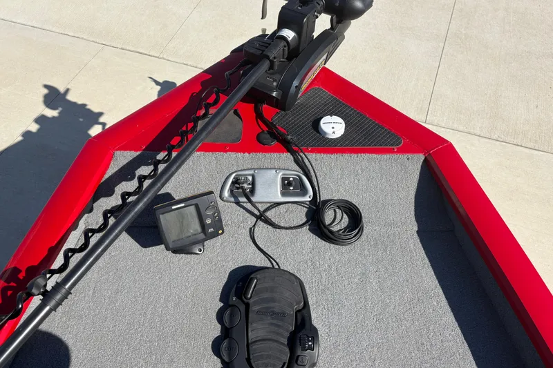 Slide: The Image of 2011 Tracker Pro Team 175 TXW boat deck with trolling motor and fish finder. - 8