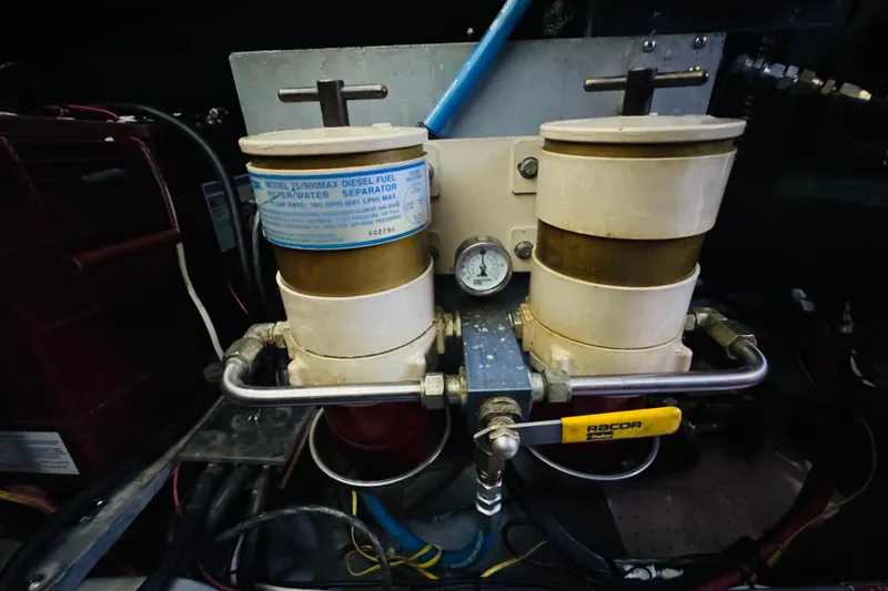 Slide: The Image of Diesel fuel filter system in a 1999 Sea Ray 400 Sedan Bridge yacht. - 100