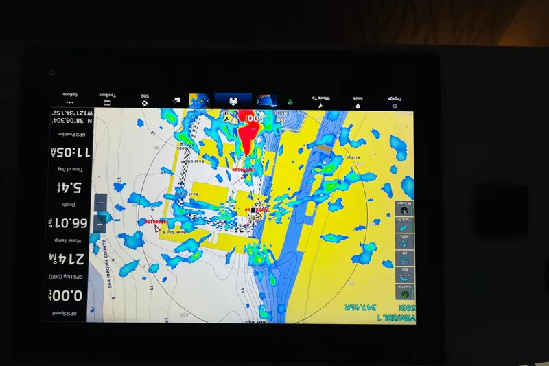 Slide: The Image of Navigation display on a 1999 Sea Ray 400 Sedan Bridge, showing detailed marine chart. - 40