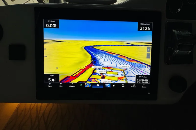 Slide: The Image of Fishfinder display on 1999 Sea Ray 400 Sedan Bridge, showing colorful sonar mapping. - 42