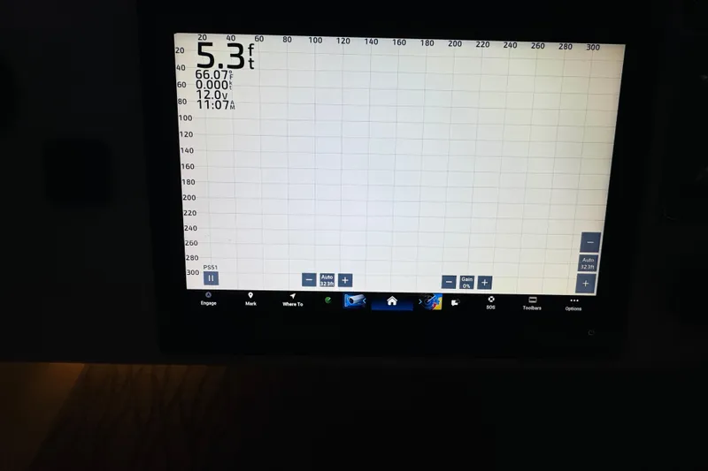 Slide: The Image of Depth gauge display on a 1999 Sea Ray 400 Sedan Bridge showing 5.3 feet. - 43