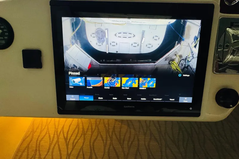 Slide: The Image of Garmin navigation display on 1999 Sea Ray 400 Sedan Bridge yacht dashboard. - 45