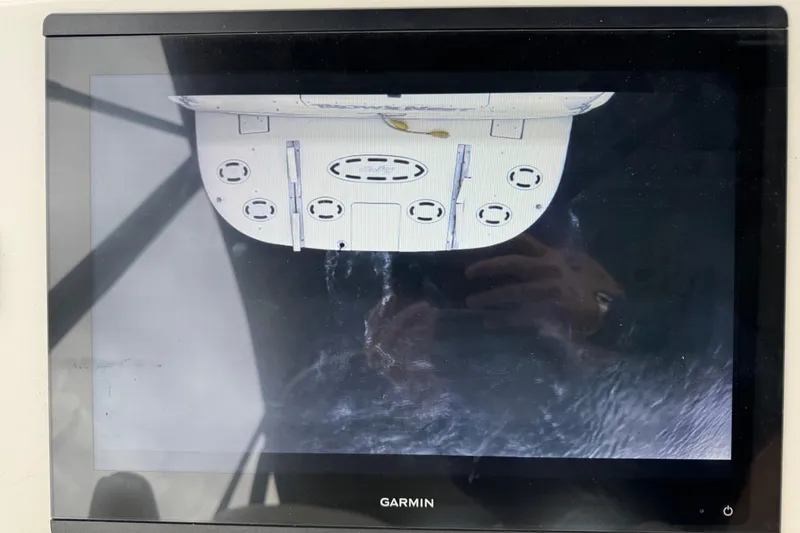 Slide: The Image of Garmin display showing aerial view of 1999 Sea Ray 400 Sedan Bridge boat. - 46