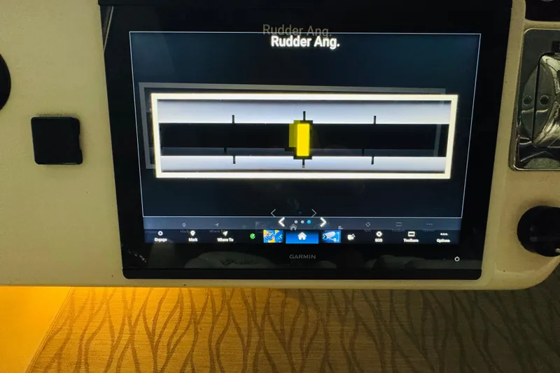 Slide: The Image of Garmin display showing rudder angle on 1999 Sea Ray 400 Sedan Bridge. - 49