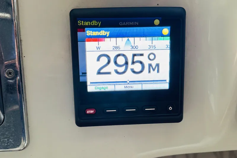 Slide: The Image of Garmin marine display showing 295° heading on 1999 Sea Ray 400 Sedan Bridge. - 50