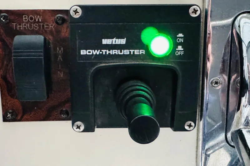 Slide: The Image of Bow thruster control panel on a 1999 Sea Ray 400 Sedan Bridge yacht. - 51