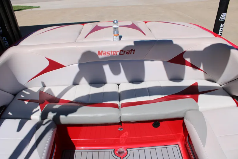 Slide: The Image of 2007 MasterCraft X2 boat interior with red and white seating design. - 11
