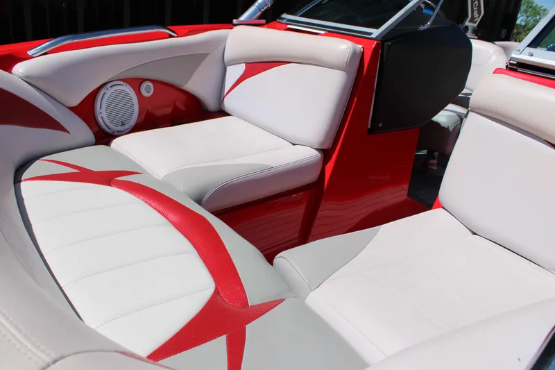 Slide: The Image of 2007 MasterCraft X2 boat interior with red and white seating and speaker detail. - 4