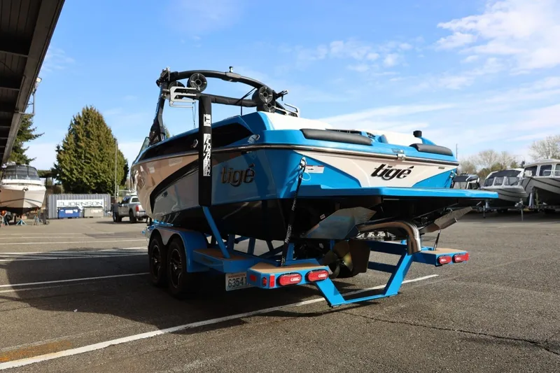 Slide: The Image of 2022 Tigé Z3 boat on trailer in parking lot, rear view. - 10