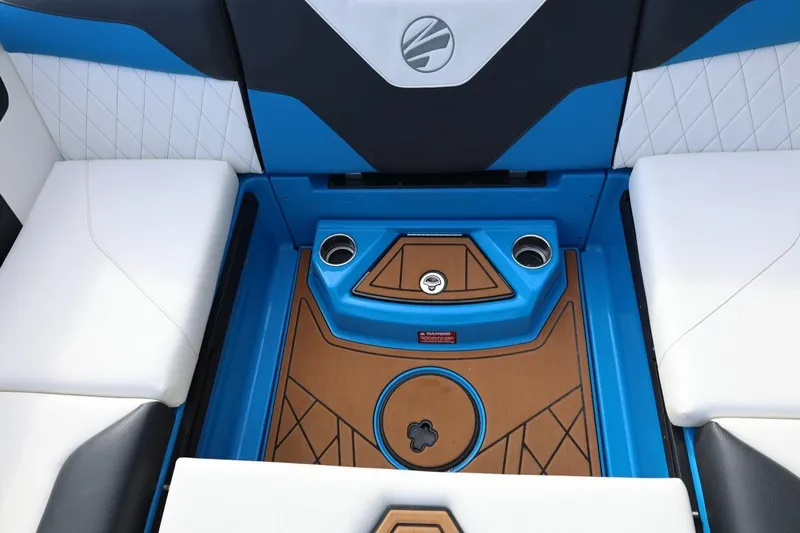 Slide: The Image of Interior of 2022 Tigé Z3 boat featuring blue and white seating with cup holders. - 42