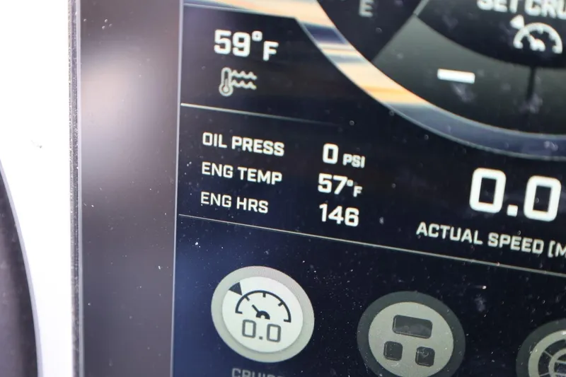 Slide: The Image of Dashboard display of a 2022 Tigé Z3 showing engine temperature and hours. - 44