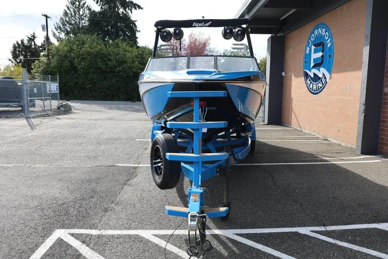 Slide: The Image of 2022 Tigé Z3 boat on trailer at Bjornson Marine parking lot. - 5