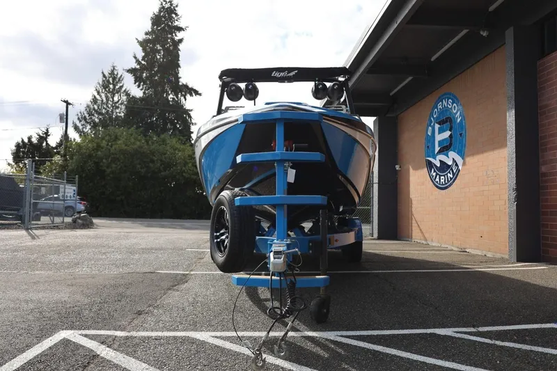 Slide: The Image of 2022 Tigé Z3 boat on trailer at Bjornson Marine dealership. - 6