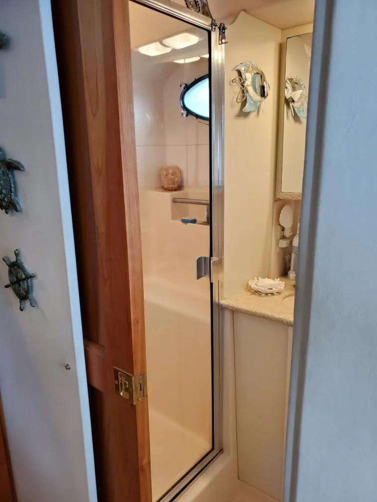 Slide: The Image of Bathroom of 2000 Silverton 422 Motor Yacht with shower. - 26