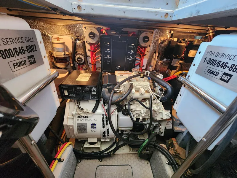 Slide: The Image of Engine room of 2000 Silverton 422 Motor Yacht with Kohler generator. - 27