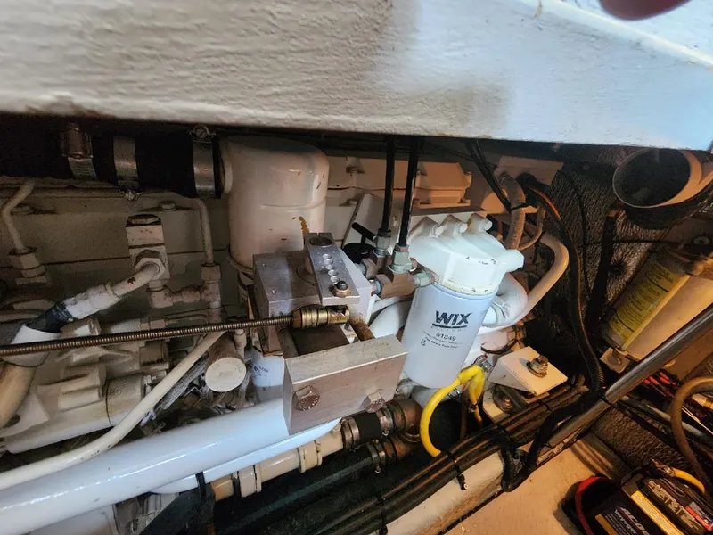 Slide: The Image of Engine room of 2000 Silverton 422 Motor Yacht with WIX filter. - 31