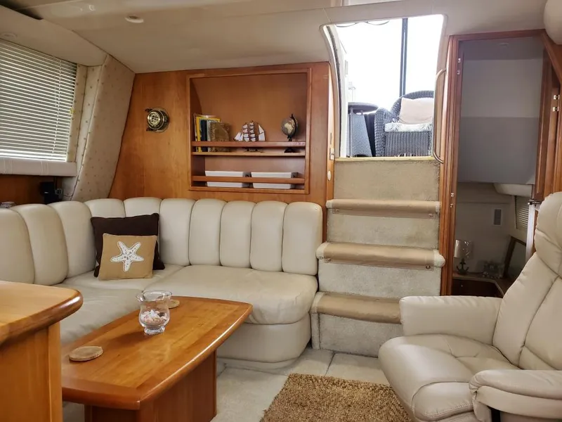Slide: The Image of Interior of 2000 Silverton 422 Motor Yacht with leather sofa. - 9