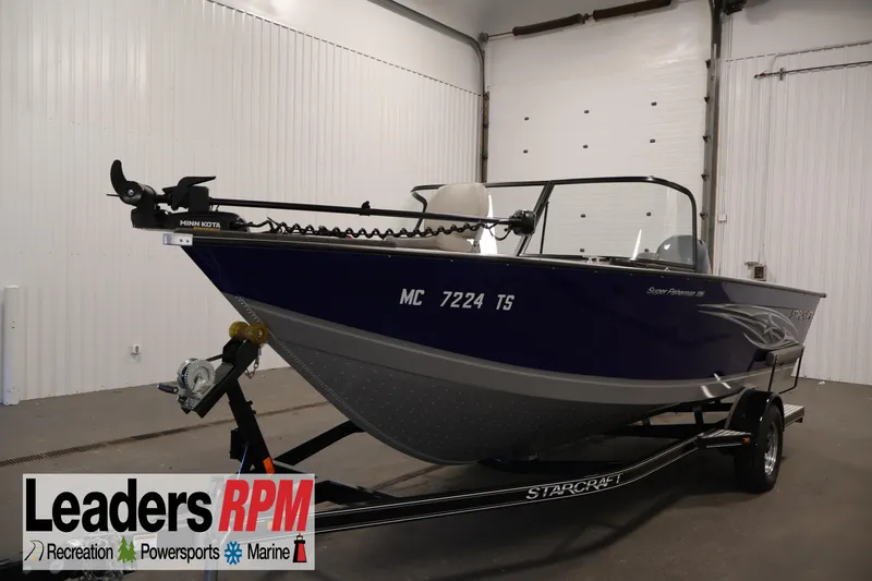 The Image of 2015 Starcraft Super Fisherman 186 boat on trailer in indoor setting. - 1