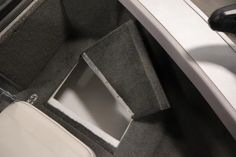 Slide: The Image of 2015 Starcraft Super Fisherman 186 boat interior storage compartment open. - 17