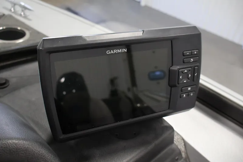 Slide: The Image of Garmin device on 2015 Starcraft Super Fisherman 186 dashboard. - 23