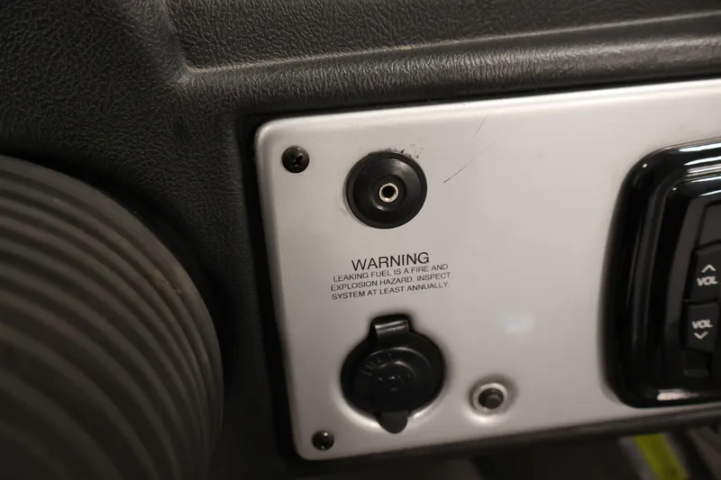 Slide: The Image of Control panel of 2015 Starcraft Super Fisherman 186 with warning label. - 25