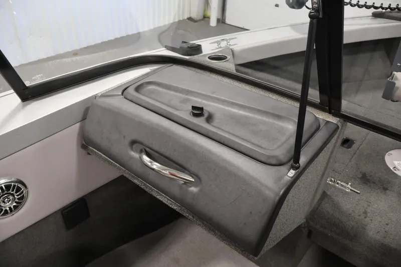 Slide: The Image of 2015 Starcraft Super Fisherman 186 boat interior with storage compartment and speaker. - 29