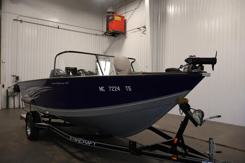 Slide: The Image of 2015 Starcraft Super Fisherman 186 boat in indoor storage on trailer. - 3