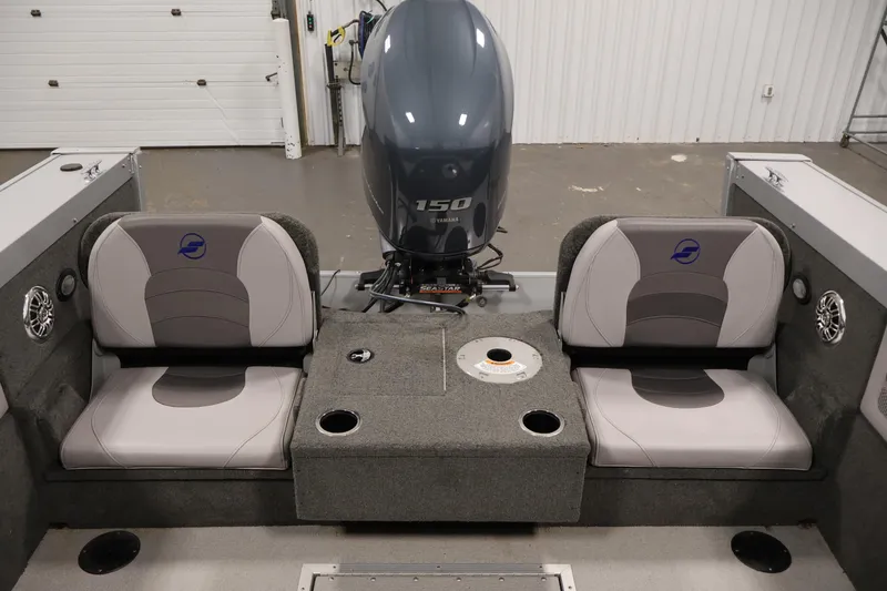 Slide: The Image of 2015 Starcraft Super Fisherman 186 boat interior with Yamaha 150 engine and seating. - 36
