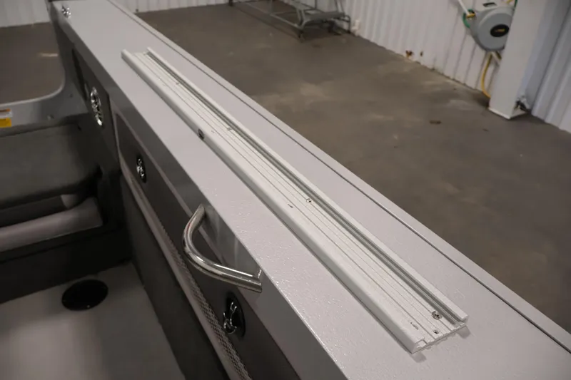 Slide: The Image of 2015 Starcraft Super Fisherman 186 boat interior with rail and handle detail. - 40