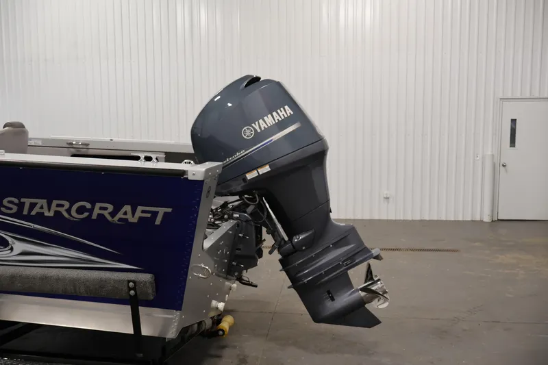 Slide: The Image of 2015 Starcraft Super Fisherman 186 with Yamaha outboard motor in a garage setting. - 41