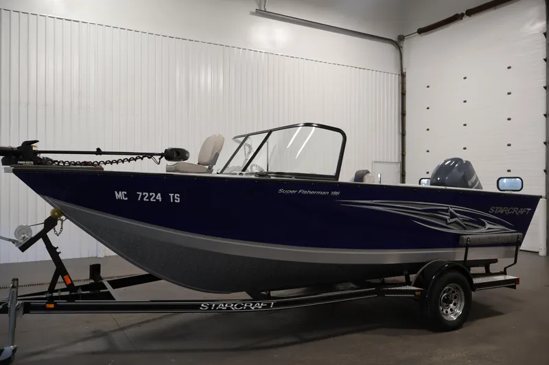 Slide: The Image of 2015 Starcraft Super Fisherman 186 boat on trailer in indoor setting. - 8