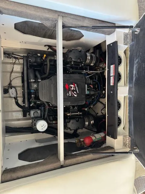 Slide: The Image of 2007 Sea Ray 230 Select boat engine compartment with MerCruiser engine. - 10