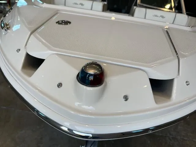 Slide: The Image of 2007 Sea Ray 230 Select boat bow with navigation light and storage compartment. - 15